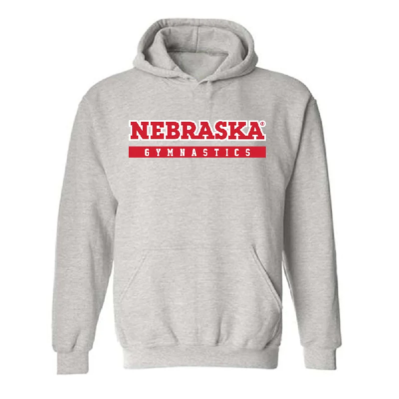 Nebraska - NCAA Women's Gymnastics : Emma Simpton - Classic Shersey Hooded Sweatshirt Hoodie with Camouflage Military Edgy Nebraska - NCAA Women's Gymnastics : Emma Simpton - Classic Shersey Hooded Sweatshirt Hoodie with Camouflage Military Edgy